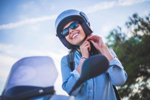 красота на скутере - blue helmets стоковые фото и изображения