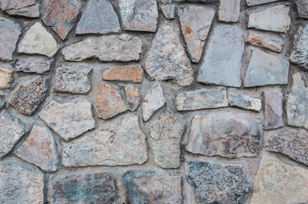 istock natural stone paving stone road from asphalt background summer 1043917964
