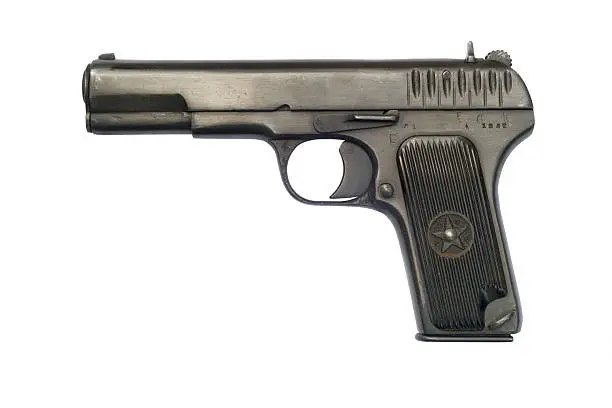 A Soviet TT33 pistol from 1942; the year the Battle of Stalingrad began. The TT-33 was widely used by Soviet troops during World War II, but did not completely replace the Nagant M1895 revolvers until after the war. Externally, the TT-33 is very similar to John Browning's blowback operated FN Model 1903 automatic pistol, but it also used Browning's short recoil dropping-barrel system from the 1911 series. Please see my Guns lightbox: