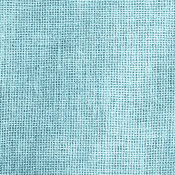 istock Hessian sackcloth woven texture pattern background in light aqua blue cyan turquoise green color tone 1043926908