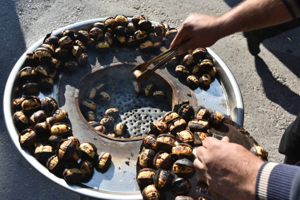 Chestnuts roasting - Turkish style in Izmir Kemeralti area stock photo