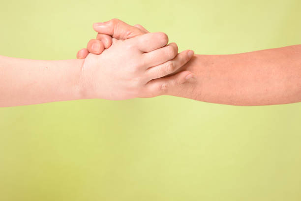 istock Female hand and male hand 1043937138