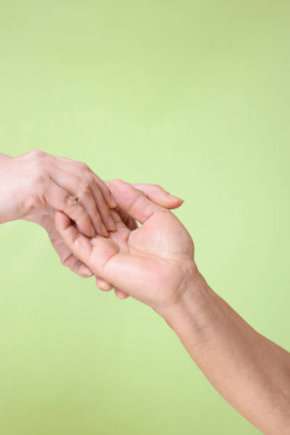 Female hand and male hand