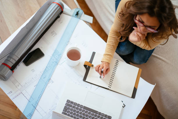istock Young business woman working from home 1043945086
