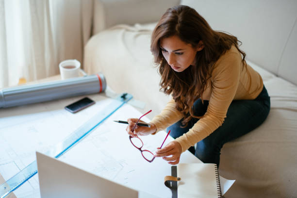 istock Young business woman working from home 1043947582
