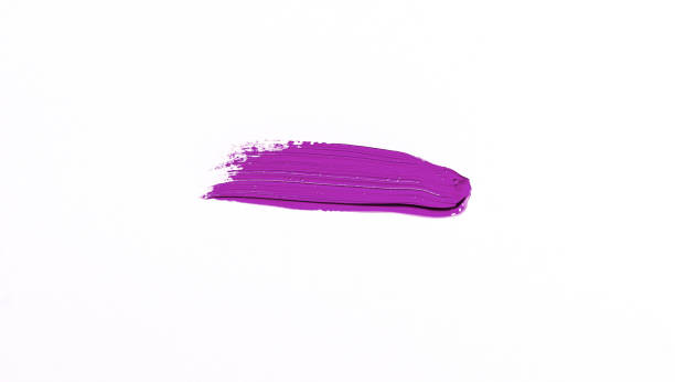 istock Purple brush stroke over white background 1043959434