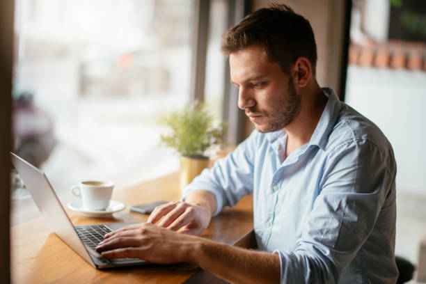 istock Handsome businessman working on a coffee break 1043988054