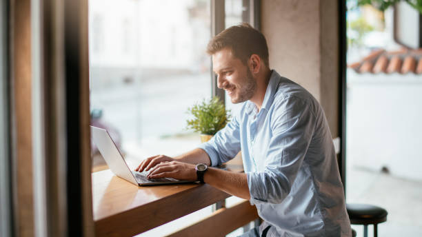 istock Handsome businessman working on a coffee break 1043988672