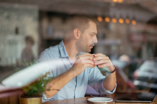 istock Businessman in cafe bar 1043994456