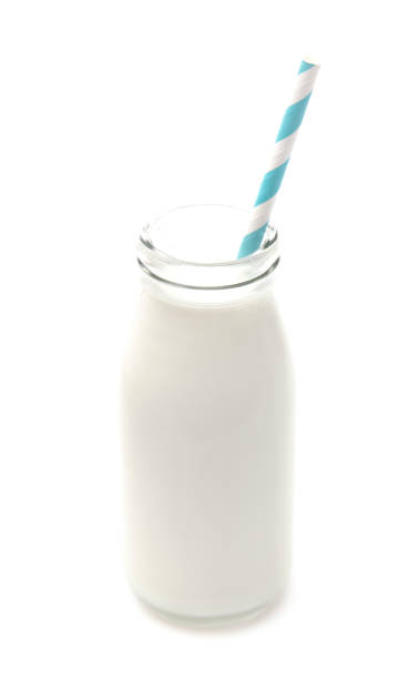 istock A Bottle of White Milk on a White Background with a Paper Straw 1043997364