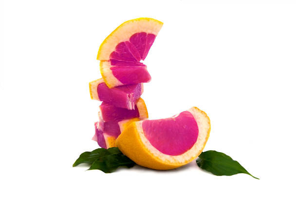 large, ripe grapefruit on white background, bright and very juicy citrus with no background.