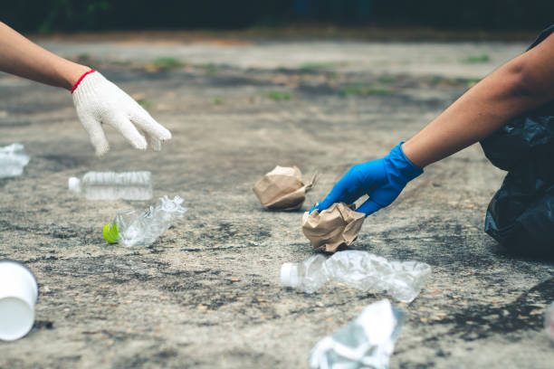 istock Group women volunteer help garbage collection charity environment. 1044022392
