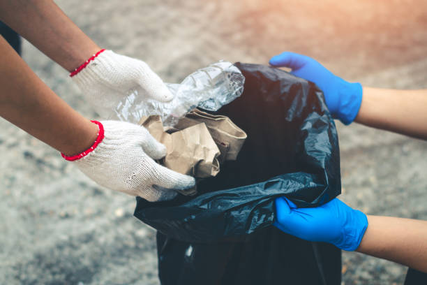 istock Group women volunteer help garbage collection charity environment. 1044022452