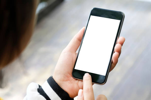 istock Mockup smartphone on female hands empty display. 1044022626