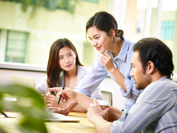 istock young asian business people working together in office 1044024826