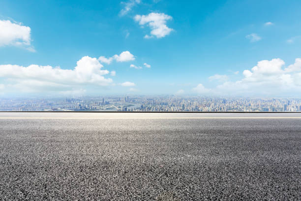 istock Panoramic skyline and buildings with empty road 1044025126