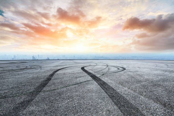 istock Panoramic skyline and buildings with empty race track road 1044028514
