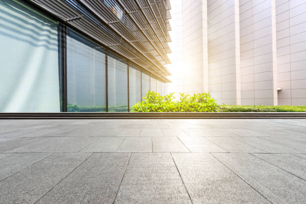 istock Square floor and modern city commercial building scenery 1044029114