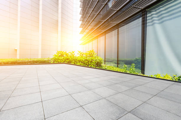 istock Square floor and modern city commercial building scenery 1044029256