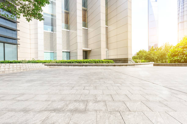 istock Square floor and modern city commercial building scenery 1044031222