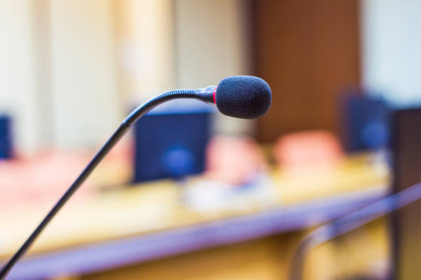 istock closeup Microphone in the meeting room 1044043028