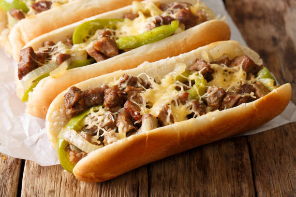 istock Philly cheese steak sandwich served on parchment paper close-up. Horizontal 1044043760