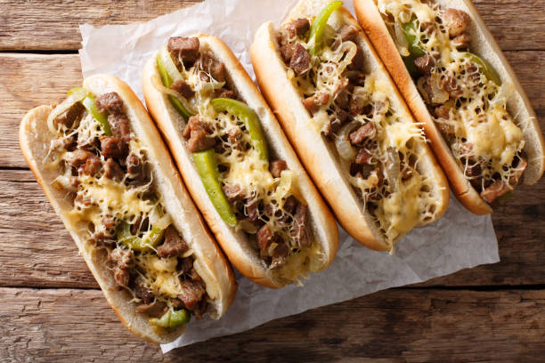istock Philly cheese steak sandwich served on parchment paper close-up. horizontal top view 1044043804