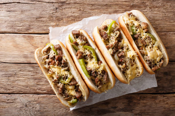istock Delicious cheesesteak sandwiches close-up on the table. Horizontal top view 1044043836