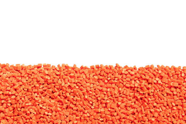 istock orange plastic resin ( Masterbatch ) isolated on white background 1044043882