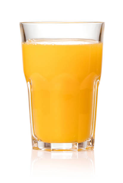 jugo de vidrio - zumo de naranja fotografías e imágenes de stock