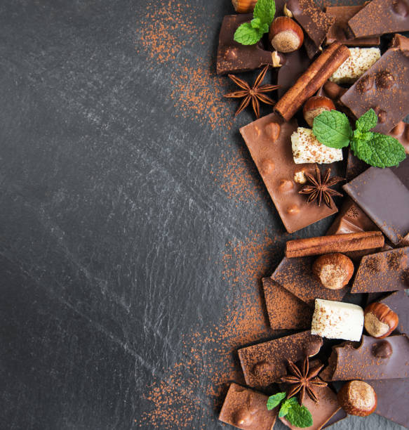 istock Chocolate with nuts on a black stone background 1044050260