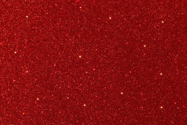 istock Red glitter lights background. defocused. 1044053990