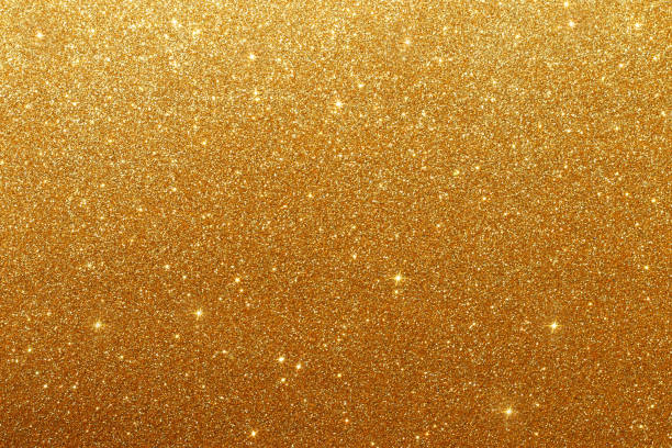 istock gold glitter vintage lights background. de-focused. 1044053996