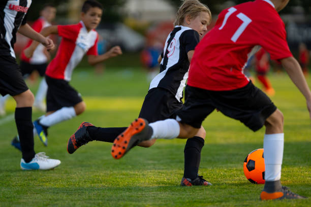 istock real soccer match of junior talents 1044058830