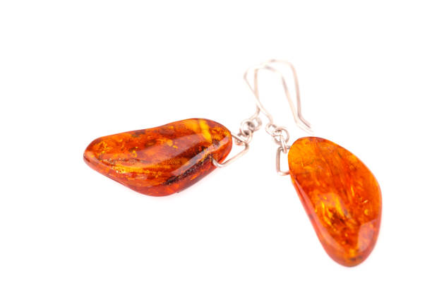 istock Stylish earrings with amber stones 1044059176