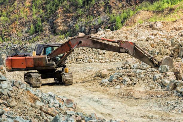 istock Crawler excavator clears the mountain road after crash 1044062890