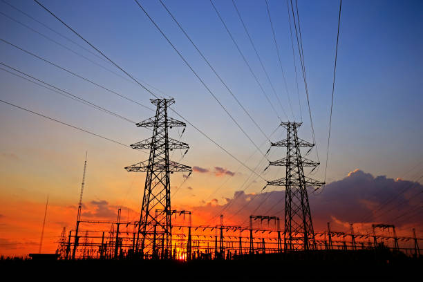 istock Electric tower, silhouette at sunset 1044066302