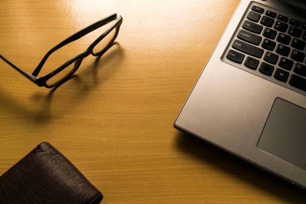 istock Laptop, Glasses and Wallet 1044071744