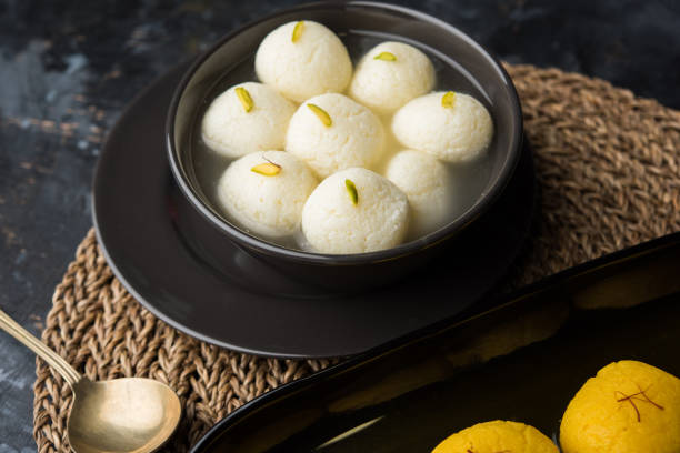 Rajbhog and Rasgulla or rosogolla are popular sweets offered to Goddess Durga in Navratri Festival, selective focus Rajbhog and Rasgulla or rosogolla are popular sweets offered to Goddess Durga in Navratri Festival, selective focus rosogolla stock pictures, royalty-free photos & images