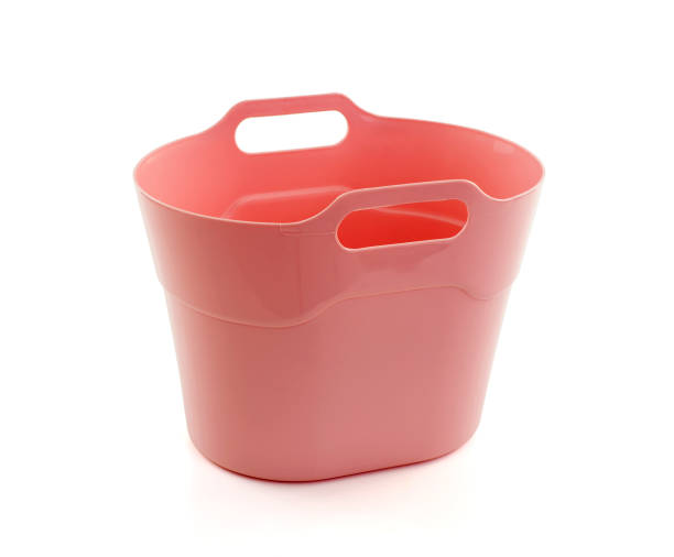istock pink bucket plastic isolated white background 1044076506