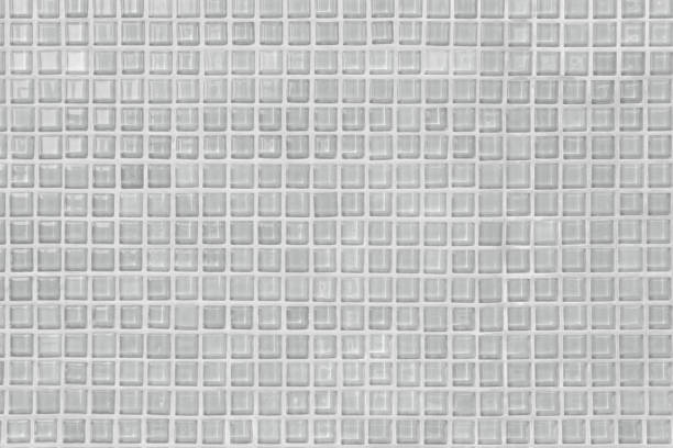 istock White and Grey the tile wall high resolution real photo or brick seamless and texture interior background. 1044080462