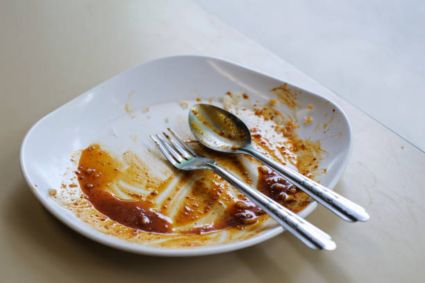 istock Plate with food left over from eating 1044083444