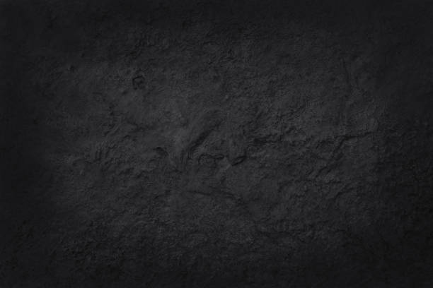 istock Dark grey black slate texture in natural pattern with high resolution for background and design art work. Black stone wall. 1044087712