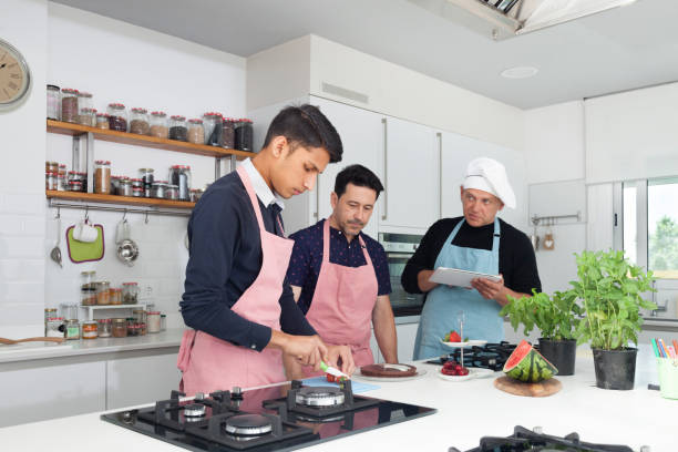 istock Small group of chefs in the kitchen 1044088640