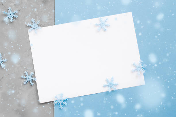 istock Christmas empty card with decorative snowflakes in blue color. 1044108636