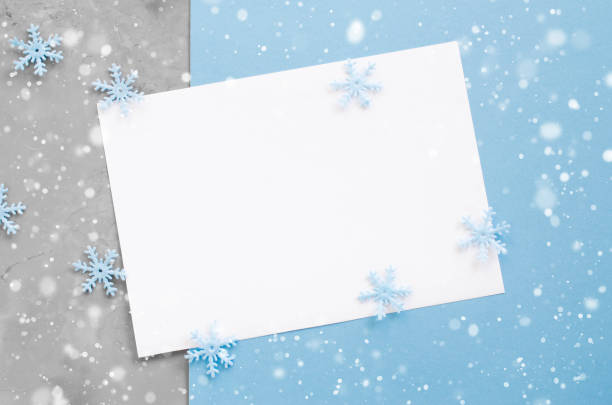 istock Christmas empty card with decorative snowflakes in blue color. 1044108668