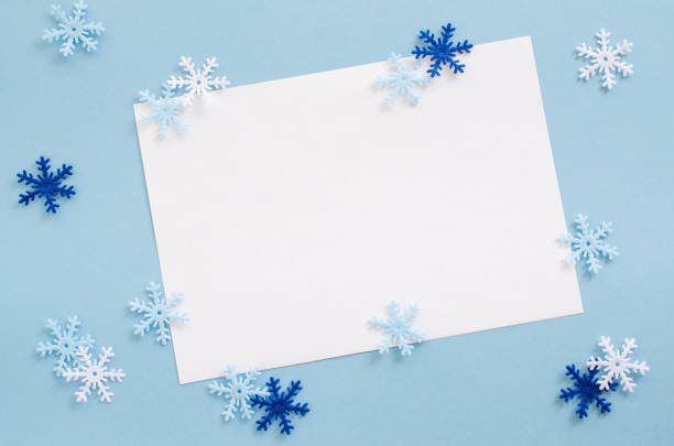 istock Christmas empty card with decorative snowflakes in blue color. 1044108676