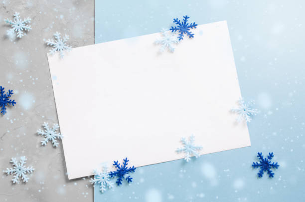 istock Christmas empty card with decorative snowflakes in blue color. 1044108678