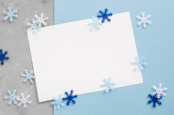 istock Christmas empty card with decorative snowflakes in blue color. 1044108680