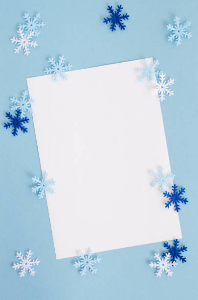 istock Christmas empty card with decorative snowflakes in blue color. 1044108742